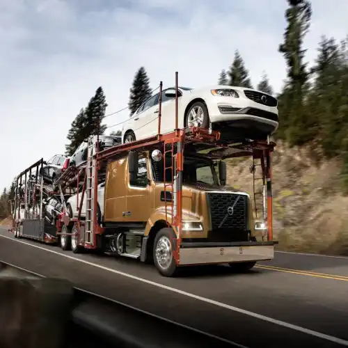 CDL car hauler truck loaded with vehicles, ready for dispatch under 2025 FMCSA rules
