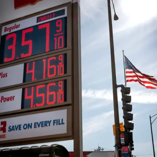 Diesel pump close-up with gas price sign (illustrating Iran war and diesel prices) (1)